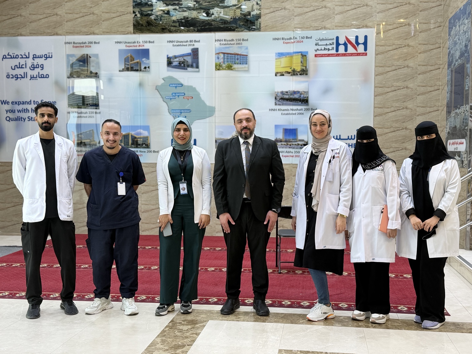 Dr. Mohamed Salama with a multidisciplinary hospital team