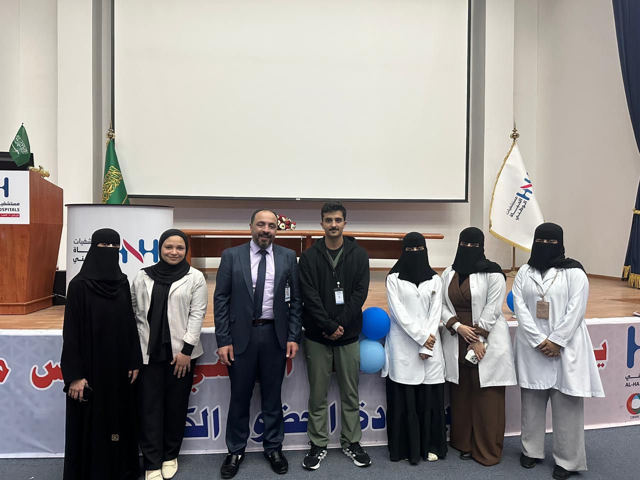 Dr. Mohamed Salama with IPC colleagues during a recognition event