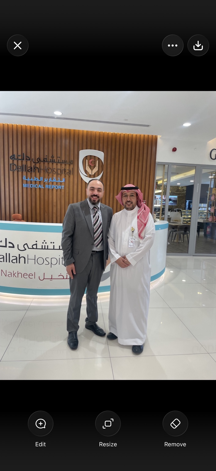 Dr. Mohamed Salama with a healthcare leader at Dallah Hospital